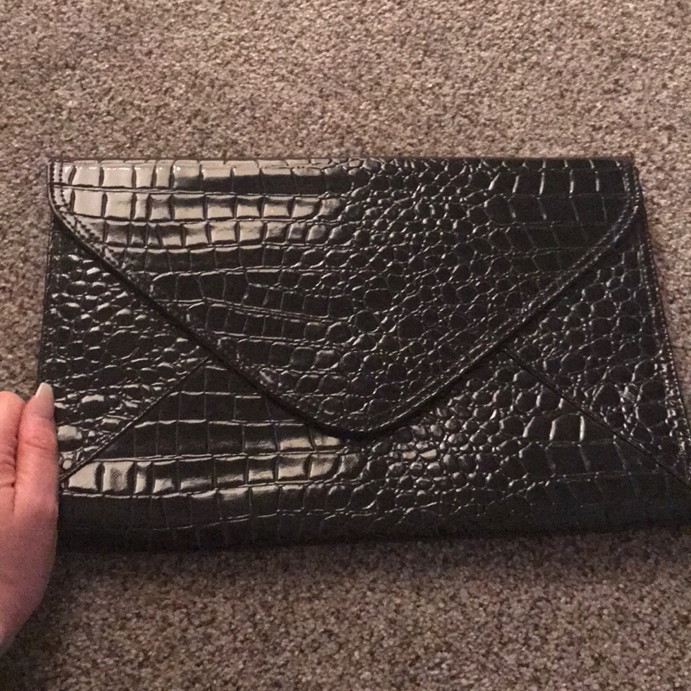 FREE WITH BUNDLE OF 4 or more XL black  clutch